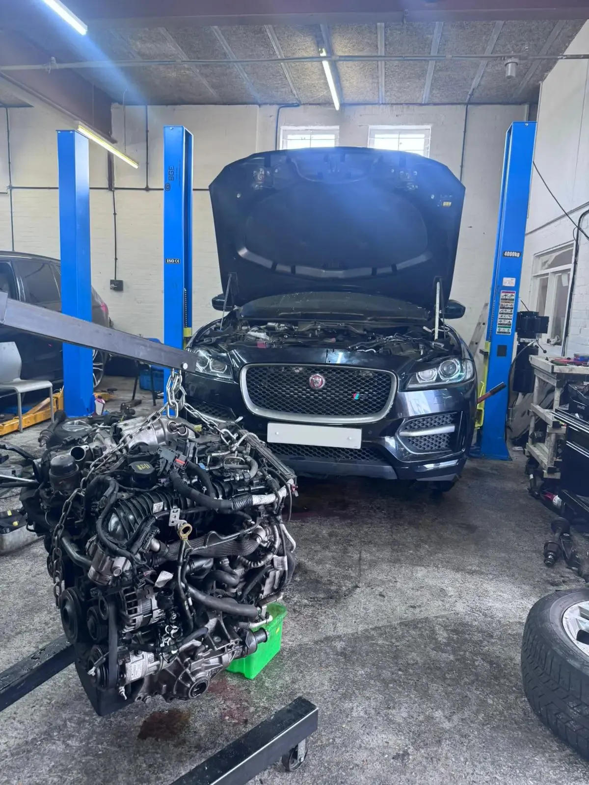 Jaguar F-Pace engine removed for rebuild at JLR Engine Specialists workshop in Billericay – IMI-certified technicians using OEM-spec parts